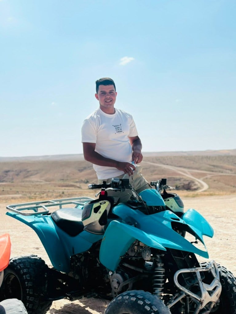Traveler on a quad bike adventure in the Moroccan desert